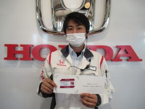 フロントマネージャーへ昇格となったサービススタッフ